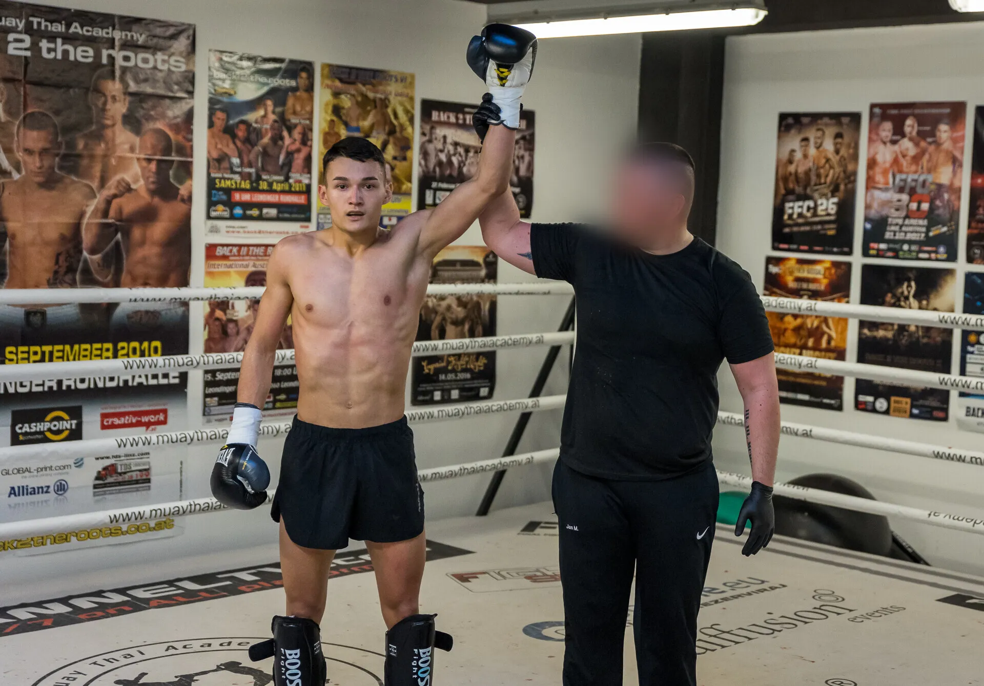 Anto having his hand raised after a win