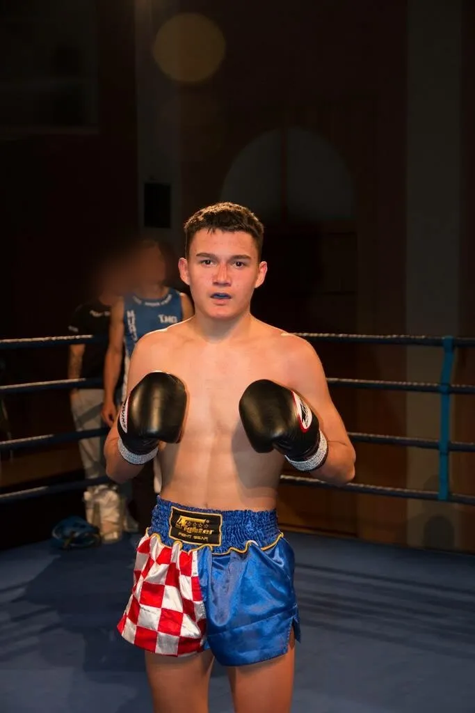 Young Anto in the ring in Croatian-checkered shorts